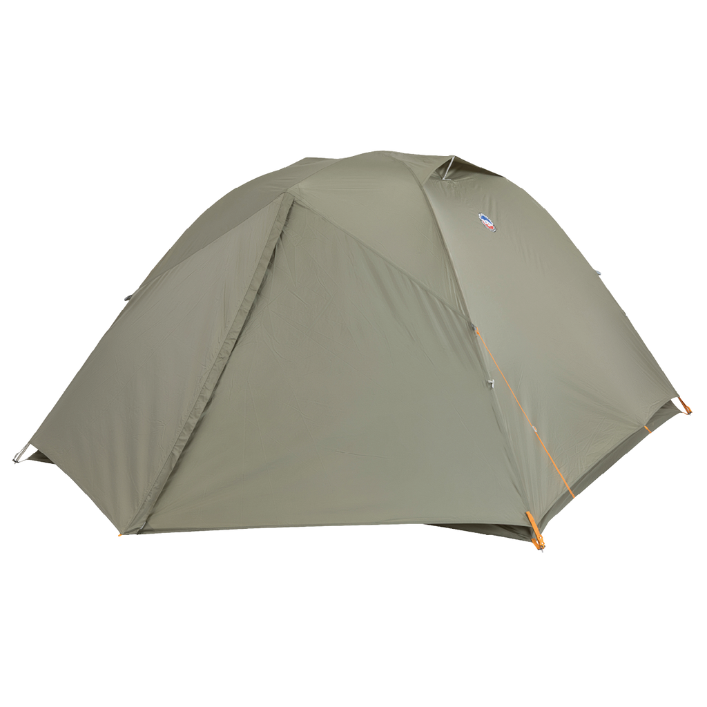 The Big Agnes Returns Blacktail 4 - Vetiver is a green, dome-shaped camping tent with full rainfly coverage and orange accents at the corners and zippers, shown set up on a plain white background.
