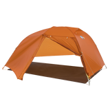 Orange Copper Spur UL3 mtnGLO® camping tent with a brown groundsheet on a white background