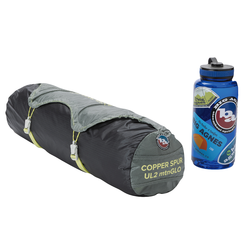 Copper Spur UL3 mtnGLO® Camping tent and water bottle on a white background