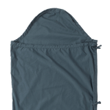 The Big Agnes Cotton Sleeping Bag Liner in dark blue features a hood, smooth texture, and side ties. Shown flat on a light background, this simple design makes it an ideal travel companion.