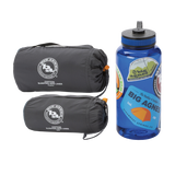 Two rolled-up Big Agnes Cotton Sleeping Bag Liners in gray are placed beside a blue water bottle with vibrant outdoor-themed stickers—ideal companions for your next adventure.