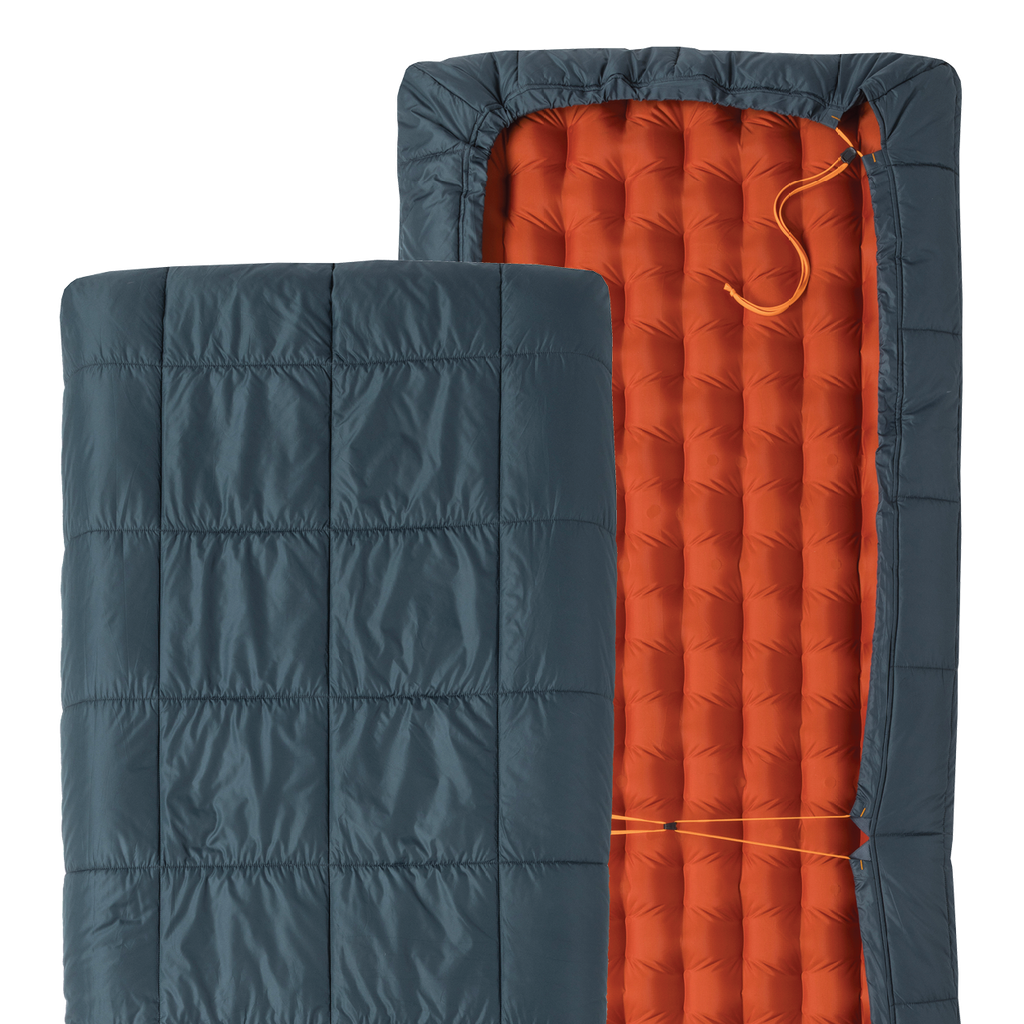 Two sections of a sleeping bag, one blue quilted and one orange inflatable, on a white background.