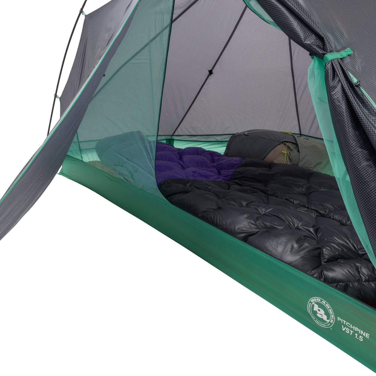 A close-up of the Big Agnes Pitchpine VST 1.5 tent interior reveals two sleeping bags side by side on the floor, with mesh sides and a partially open door in this ultralight green and grey shelter.