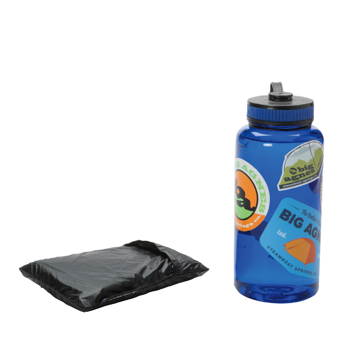 A folded black Pitchpine VST 1.5 Footprint from Big Agnes Returns sits beside a blue water bottle with colorful outdoor-themed stickers, both placed on a plain white background.
