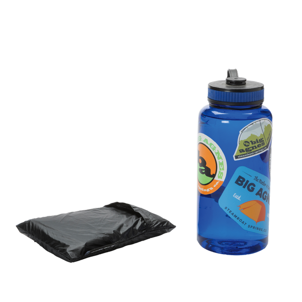 A folded black Pitchpine VST 1.5 Footprint from Big Agnes Returns sits beside a blue water bottle with colorful outdoor-themed stickers, both placed on a plain white background.