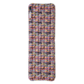 Multicolored inflatable camping pad on a white background