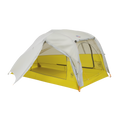 The Big Agnes Salt Creek 2 is a lightweight, two-person backpacking tent with a yellow base, mesh sides for panoramic views, and a light gray rainfly partially covering the top, set up and ready for use.