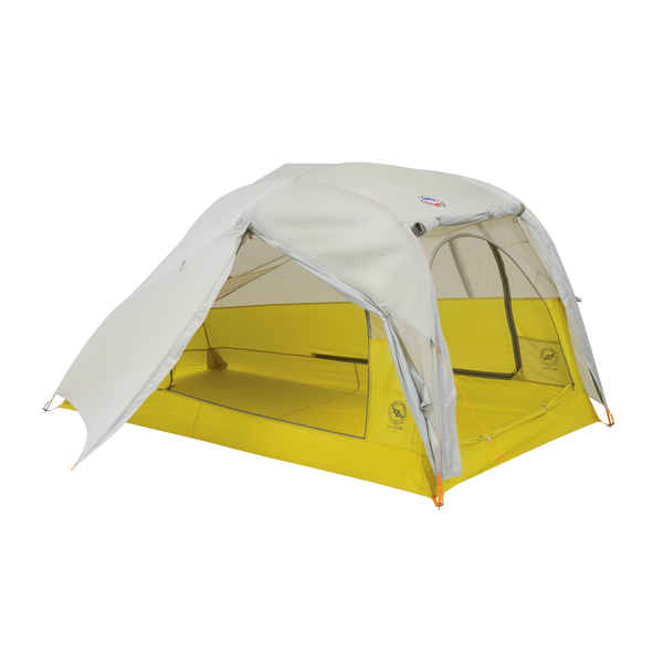The Big Agnes Returns Salt Creek 2 is a lightweight, two-person backpacking tent with a yellow base, mesh sides for panoramic views, and a light gray rainfly partially covering the top, set up and ready for use.