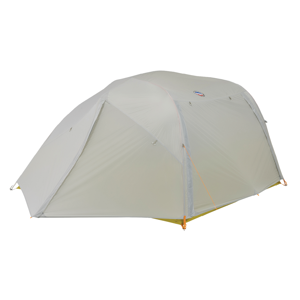 The Big Agnes Salt Creek 3 is a light grey, dome-shaped car camping tent with a rainfly, orange adjustment cords, and corner stakes, designed for comfort and panoramic outdoor views. Shown pitched on a white background.