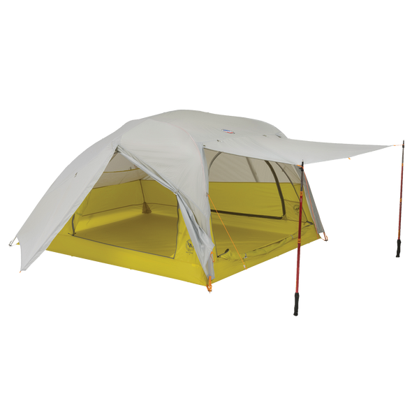 The Big Agnes Returns Salt Creek 3, shown in yellow and gray on a white background, is a backpacking tent with a spacious interior, large rainfly with extended awning supported by two trekking poles, and mesh windows for panoramic views.