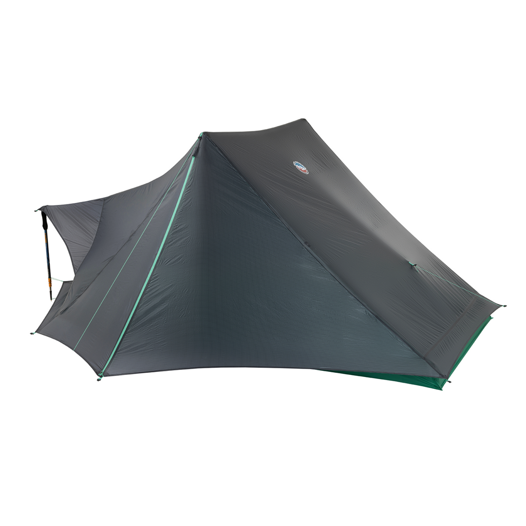 The Big Agnes Returns String Ridge VST 1.5 is a dark gray, modern tent with angular sides and green trim, shown on a white background. This ultralight shelter boasts a tall central peak, spacious interior, and sturdy design.
