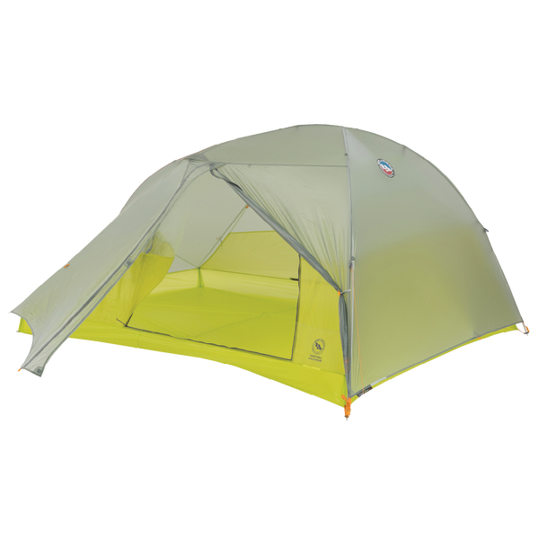 Green camping tent with a white background
