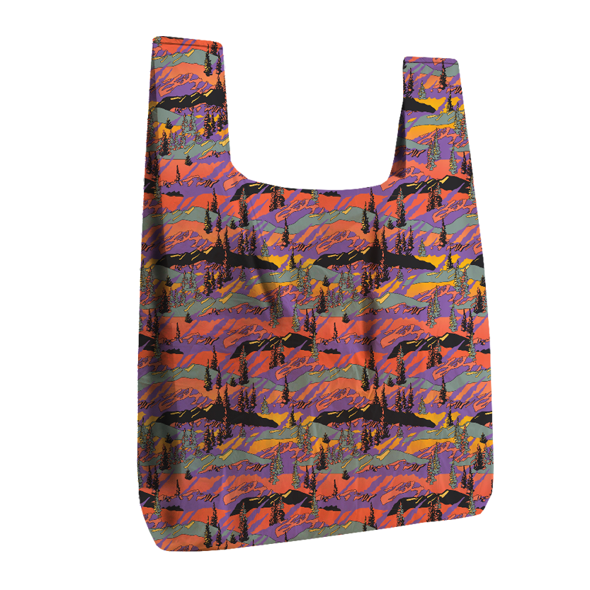 Reusable shopping bag with a colorful mountain pattern on a white background