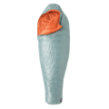 The Big Agnes Returns Women's Greystone 30° sleeping bag in light blue, featuring DownTek insulation, stands upright against a white background. Its mummy-style hood is slightly open, showing the bright orange interior lining.