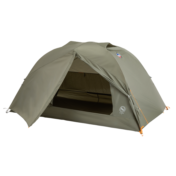 A green, dome-shaped Big Agnes Returns Blacktail 2 - Vetiver tent is pitched with its front entrance open to reveal the interior. This lightweight backpacking tent stands on a plain white background.